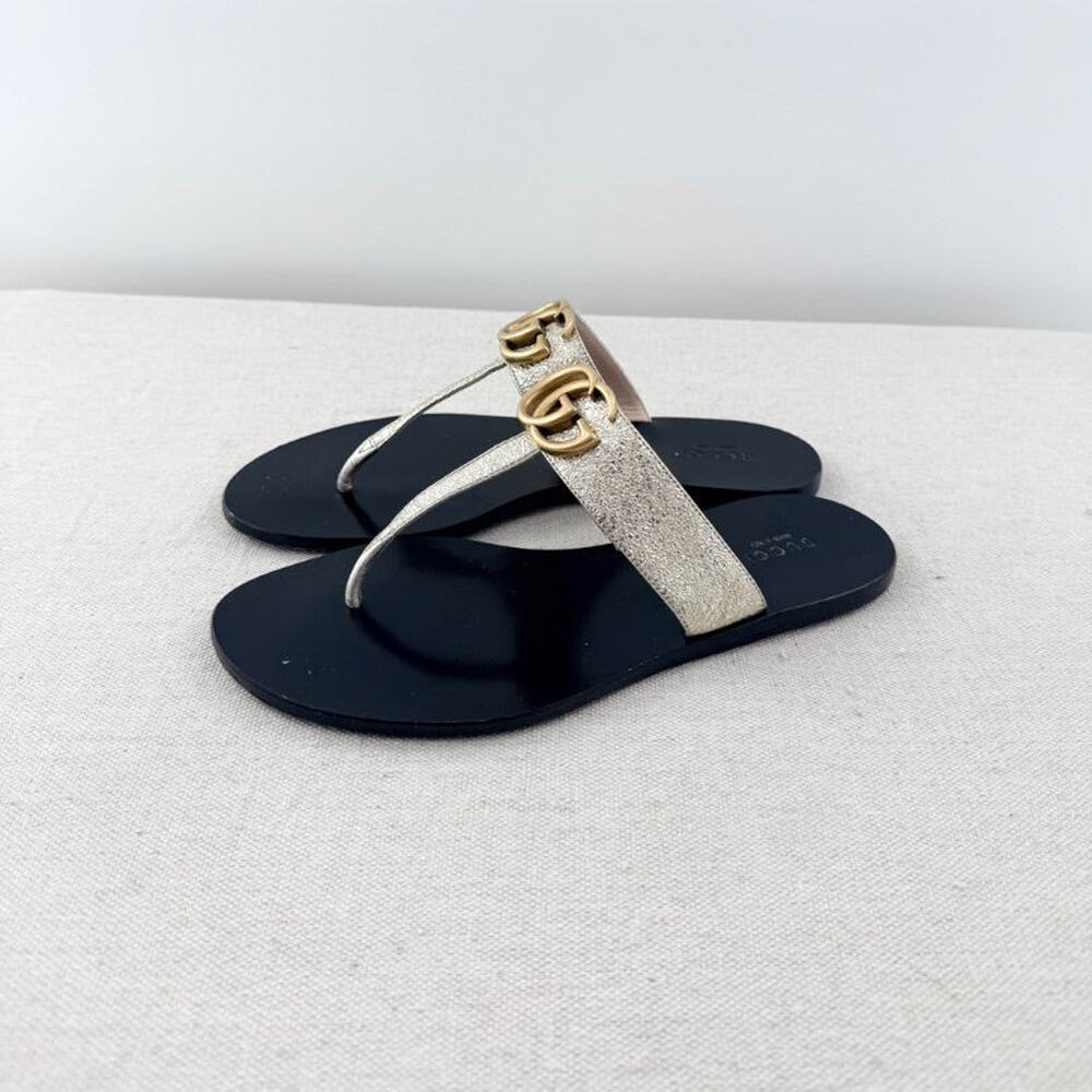 Gucci Metallic Gold Leather GG Marmont Thong Flat Sandals Black Gold Womens 37